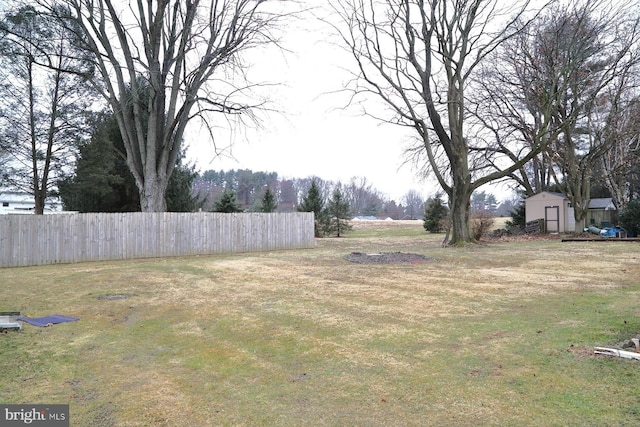 view of yard with fence