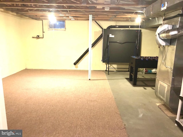 unfinished basement with heating unit