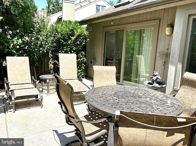 view of patio with outdoor dining area