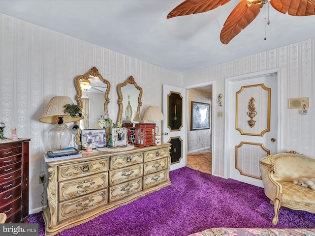 bedroom with wallpapered walls