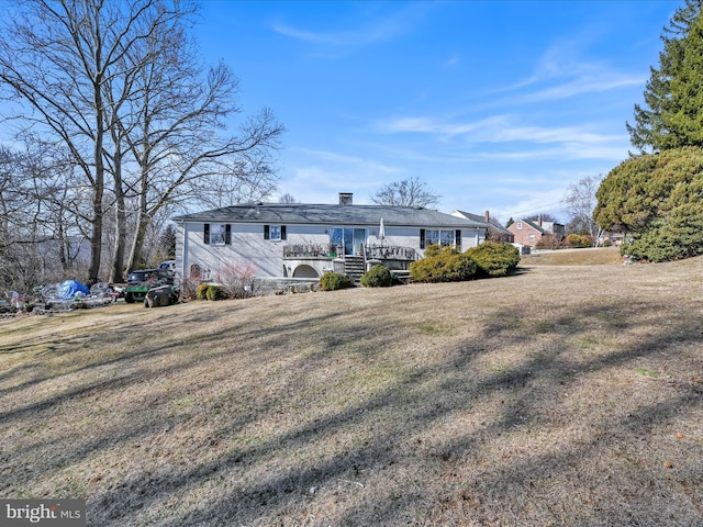 exterior space with a front yard