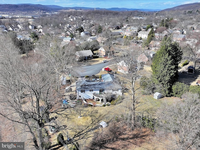 drone / aerial view featuring a mountain view