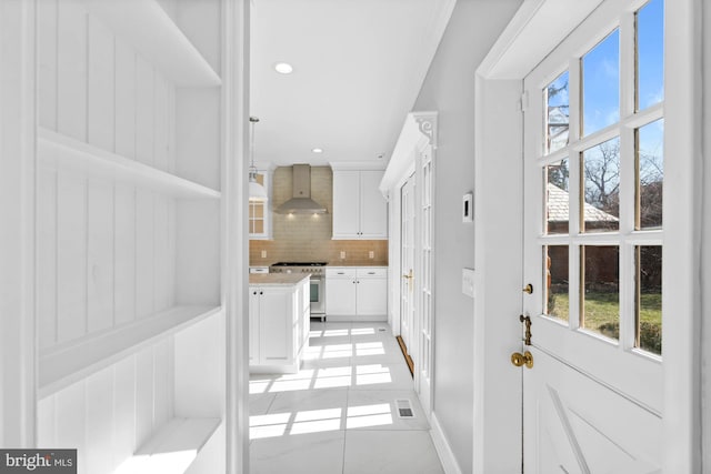 interior space featuring light tile patterned floors, visible vents, and recessed lighting