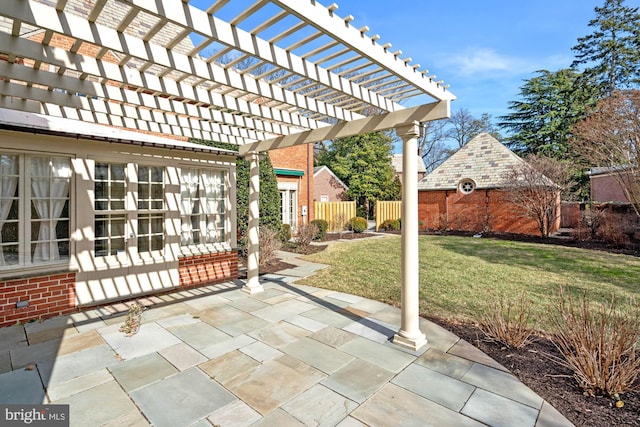 view of patio with fence and a pergola