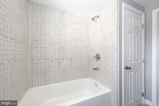 bathroom with shower / bath combination