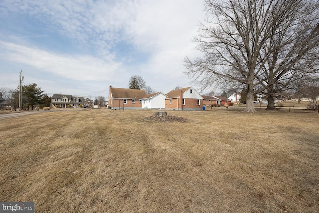 view of yard with fence