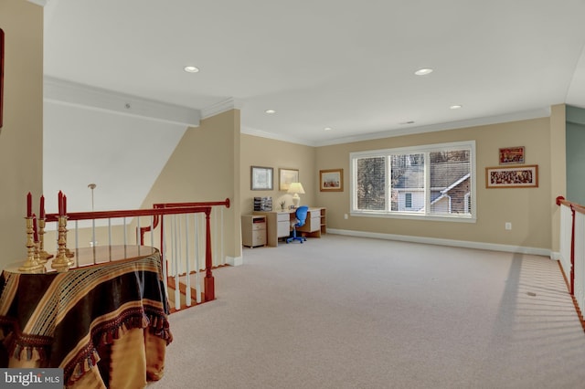 interior space with an upstairs landing, baseboards, and ornamental molding