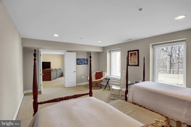 carpeted bedroom with recessed lighting and baseboards