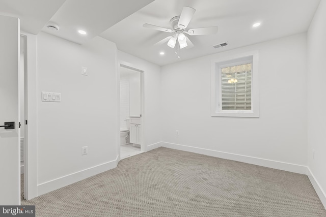 empty room featuring baseboards, visible vents, ceiling fan, and carpet flooring