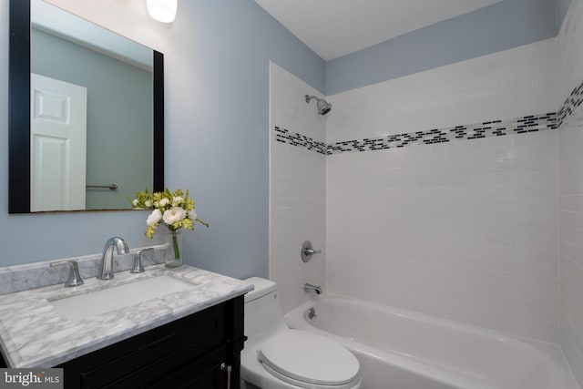 bathroom with vanity, toilet, and bathing tub / shower combination