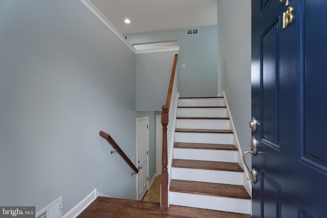 stairs featuring tile patterned flooring, visible vents, and recessed lighting