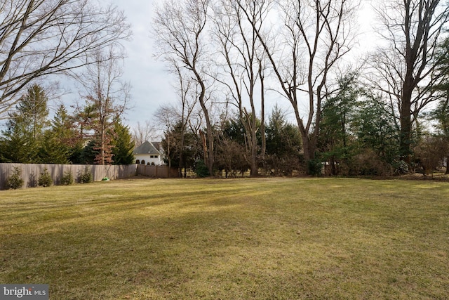 view of yard featuring fence