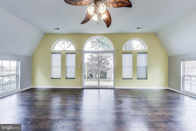 interior space featuring visible vents, ceiling fan, vaulted ceiling, wood finished floors, and baseboards