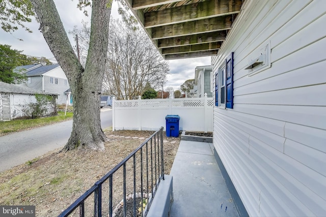 view of patio / terrace featuring fence