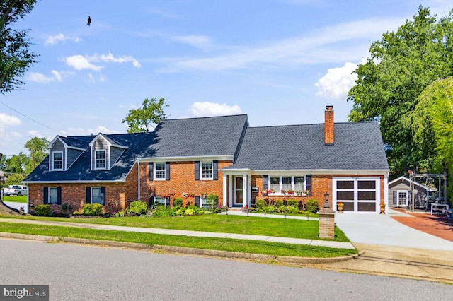 split level home featuring brick siding, roof with shingles, concrete driveway, an attached garage, and a front lawn