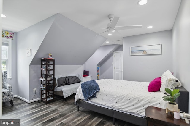 bedroom featuring lofted ceiling, recessed lighting, wood finished floors, a ceiling fan, and baseboards