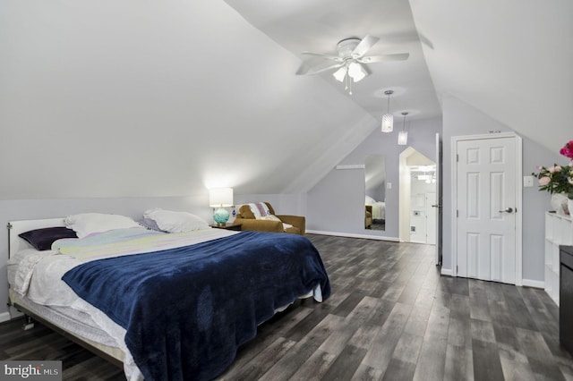 bedroom with lofted ceiling, ceiling fan, dark wood finished floors, and baseboards