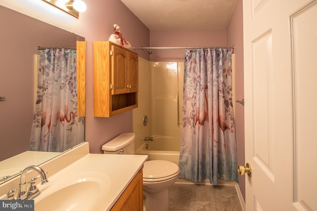 bathroom featuring shower / bath combination with curtain, vanity, and toilet