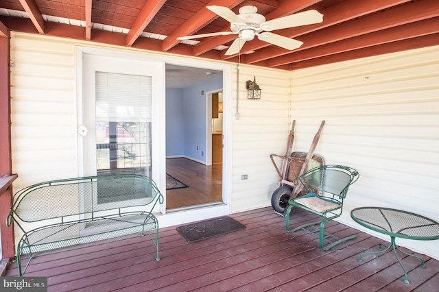 wooden deck with ceiling fan