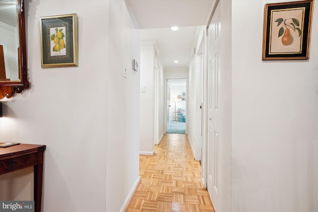 corridor with recessed lighting and baseboards