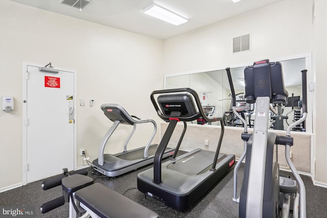 workout area with baseboards and visible vents