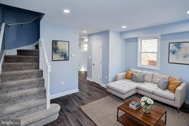 living area featuring recessed lighting, stairway, baseboards, and wood finished floors