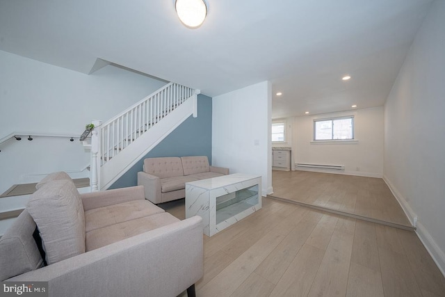 426 Hampden Rd, Upper Darby, PA 19082 - living room with a baseboard heating unit, stairs, light wood finished floors, baseboards, and recessed lighting
