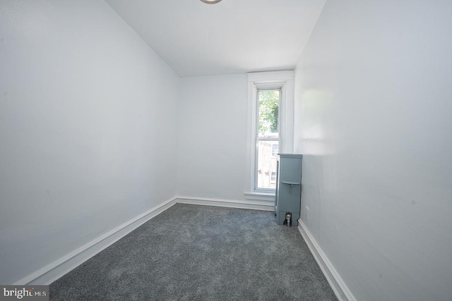 426 Hampden Rd, Upper Darby, PA 19082 - empty room with dark carpet and baseboards