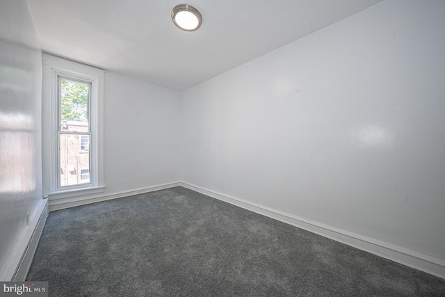 426 Hampden Rd, Upper Darby, PA 19082 - spare room with dark carpet and baseboards
