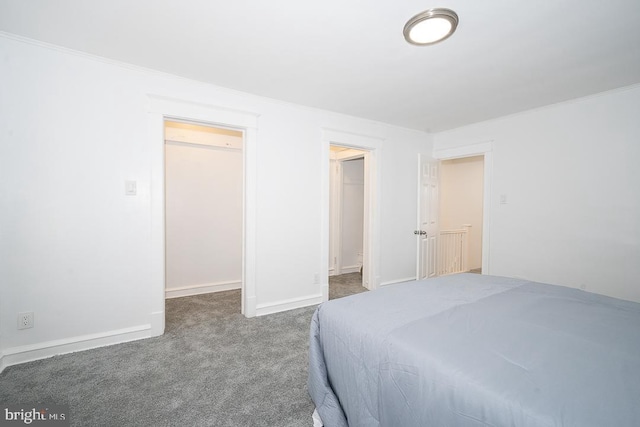 426 Hampden Rd, Upper Darby, PA 19082 - carpeted bedroom with a spacious closet, a closet, ornamental molding, and baseboards