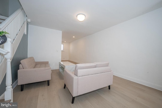 426 Hampden Rd, Upper Darby, PA 19082 - living room with light wood-style flooring, stairs, and baseboards
