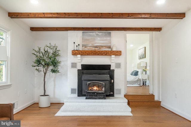 details featuring visible vents, baseboards, and wood finished floors