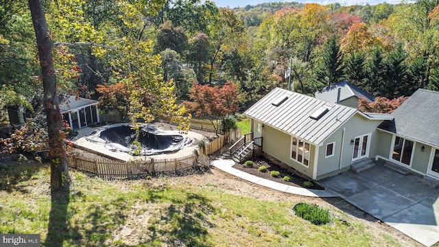 aerial view featuring a view of trees