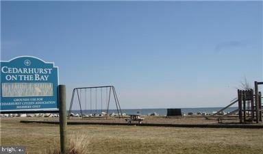 surrounding community featuring a water view