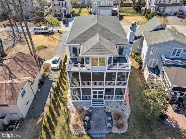 birds eye view of property featuring a residential view