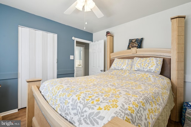 bedroom with a ceiling fan, a closet, and wood finished floors