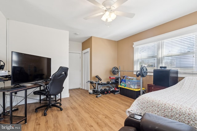 bedroom with ceiling fan and wood finished floors