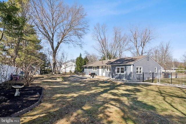 exterior space featuring a patio area and fence