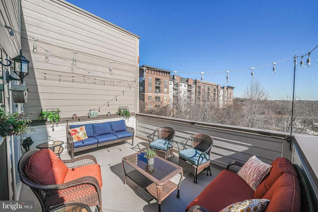 view of patio / terrace featuring outdoor lounge area and a balcony