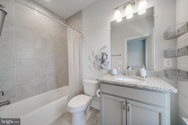 bathroom featuring vanity, tile patterned floors, toilet, and shower / bath combo with shower curtain