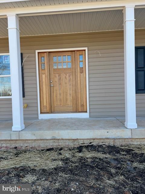 property entrance with a porch