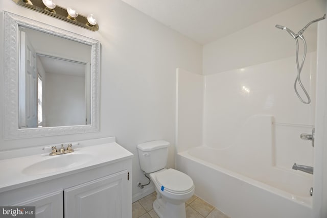 bathroom featuring toilet, shower / tub combination, vanity, and tile patterned floors