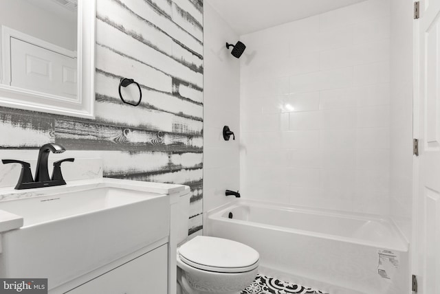 full bath with toilet, tub / shower combination, and vanity