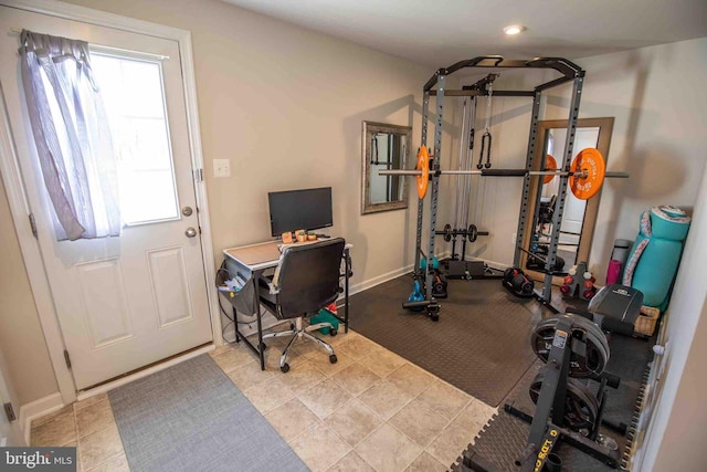 exercise area with baseboards