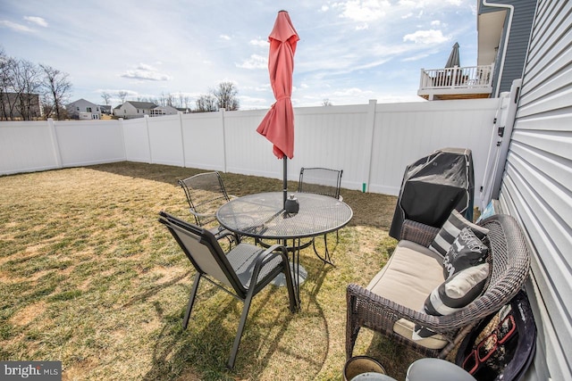 view of patio featuring area for grilling and a fenced backyard