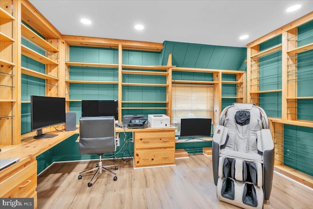 office with recessed lighting, built in study area, and wood finished floors