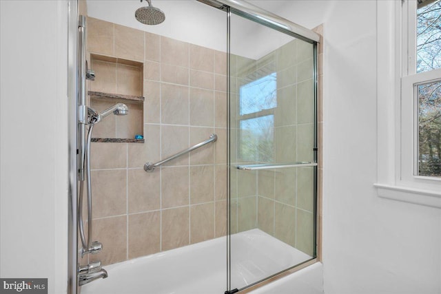 bathroom featuring enclosed tub / shower combo