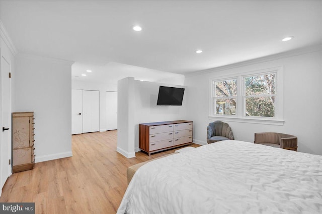 bedroom with recessed lighting, light wood-style flooring, baseboards, and ornamental molding