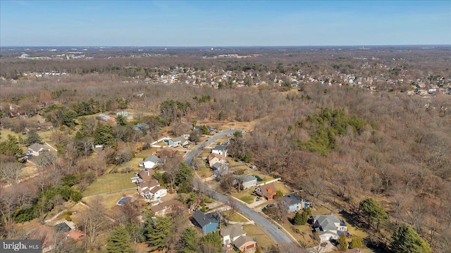 birds eye view of property with a residential view