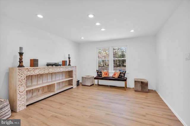 miscellaneous room with recessed lighting and wood finished floors